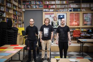 Grupa ETC [The ETC Group] members ready to perform the scores provided by the workshop participants.