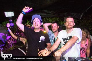 Voitek of catz n dogz wearing a WARSAW T-shirt at The BPM Festival CANIBAL ROYAL, Playa Del Carmen, Mexico (2013).