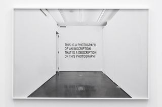 This Is a Photograph of an Inscription That Is a Description of This Photograph (2016) framed.